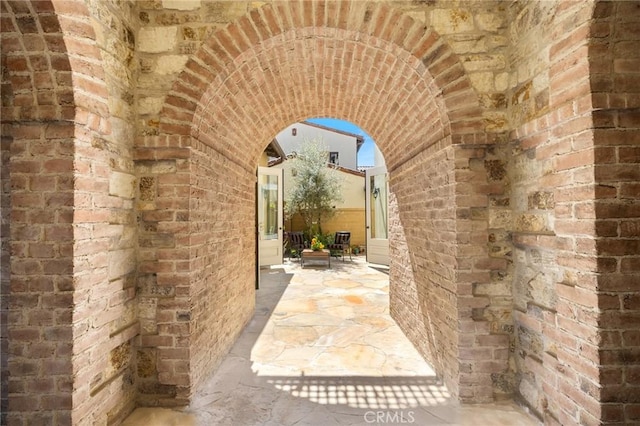3 Observatory, Newport Coast, CA 92657 - property entrance with brick siding and a patio