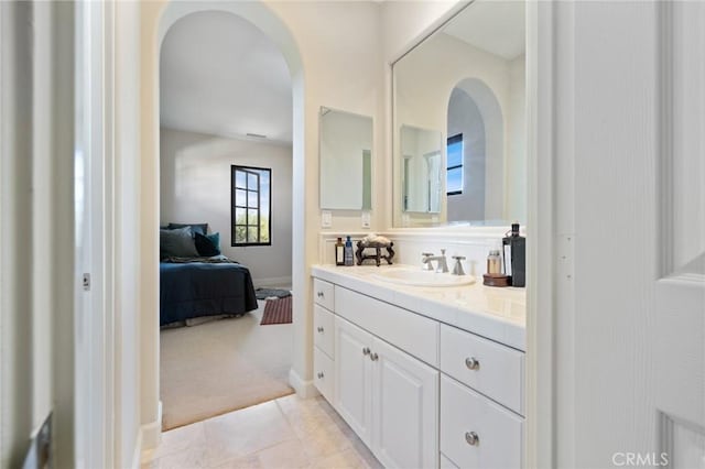 3 Observatory, Newport Coast, CA 92657 - bathroom with vanity, baseboards, tile patterned floors, and connected bathroom