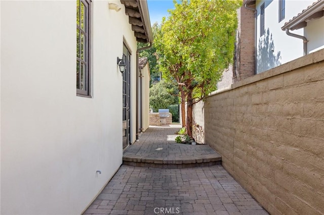 3 Observatory, Newport Coast, CA 92657 - view of property exterior featuring a patio area and stucco siding