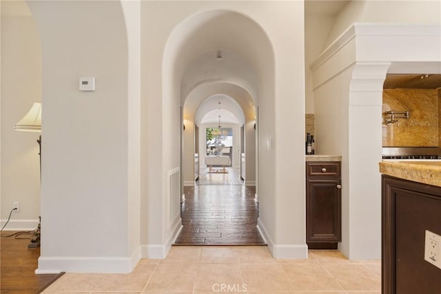 3 Observatory, Newport Coast, CA 92657 - hall featuring arched walkways and baseboards
