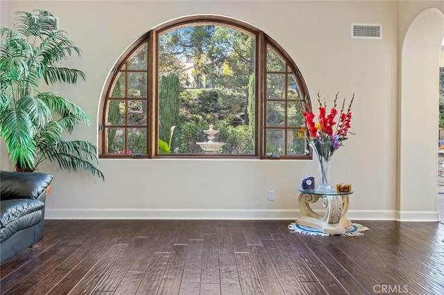 3 Observatory, Newport Coast, CA 92657 - unfurnished room with arched walkways, wood-type flooring, and baseboards