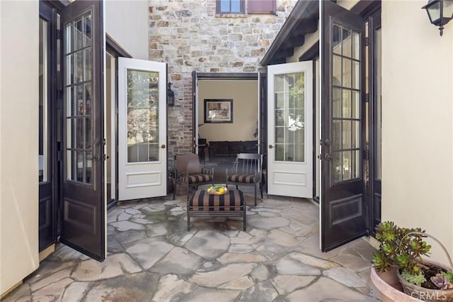 3 Observatory, Newport Coast, CA 92657 - doorway to property featuring a patio area, stucco siding, stone siding, and outdoor lounge area