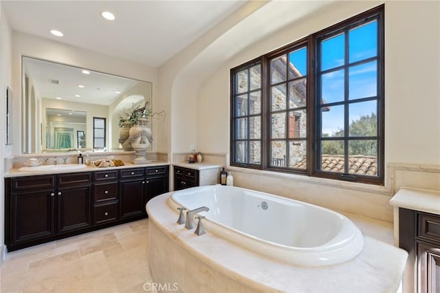 3 Observatory, Newport Coast, CA 92657 - full bath featuring vanity, a garden tub, and recessed lighting