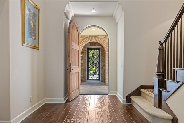 3 Observatory, Newport Coast, CA 92657 - foyer entrance featuring dark wood-type flooring, baseboards, and stairs