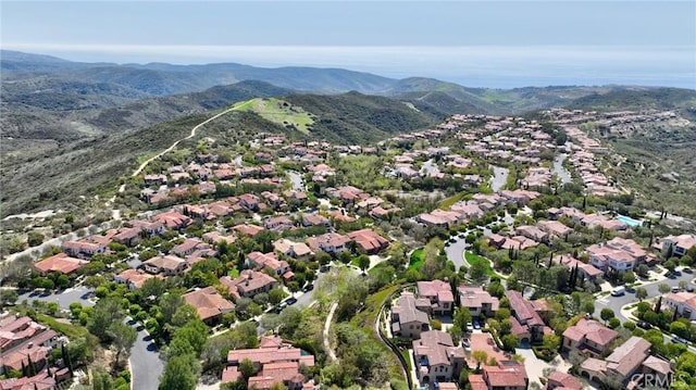 aerial view with a mountain view and a residential view
