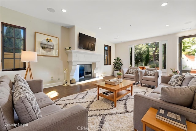 3 Observatory, Newport Coast, CA 92657 - living room with wood finished floors, baseboards, recessed lighting, and a glass covered fireplace