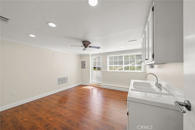 interior space featuring a sink, a ceiling fan, visible vents, and recessed lighting