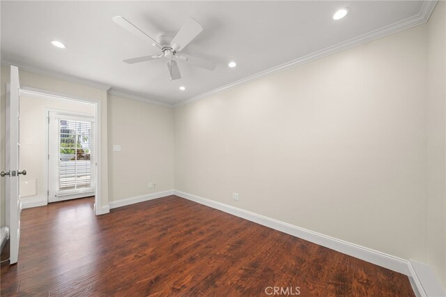 unfurnished room with dark wood-style flooring, baseboards, ornamental molding, and recessed lighting