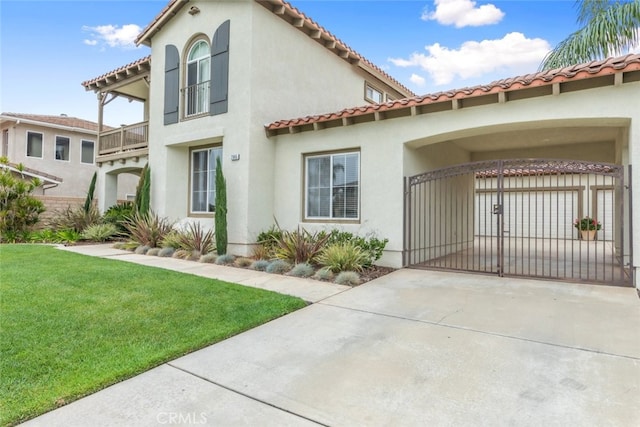2845 Keystone Cir, Corona, CA 92882 - view of front facade with a tiled roof, stucco siding, a front lawn, and a gate