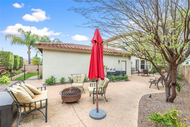 2845 Keystone Cir, Corona, CA 92882 - view of patio featuring an outdoor fire pit