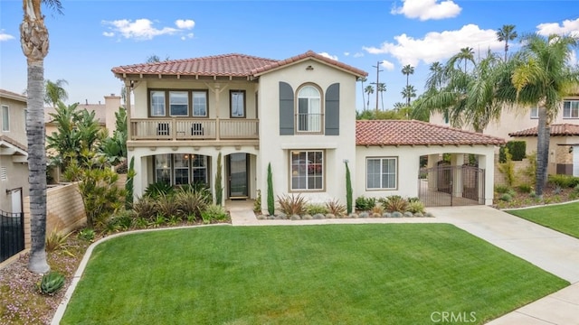 2845 Keystone Cir, Corona, CA 92882 - mediterranean / spanish house featuring a tile roof, stucco siding, driveway, a balcony, and a gate