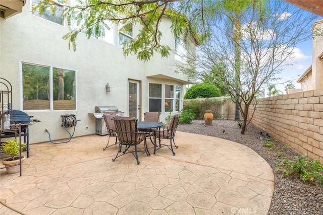 2845 Keystone Cir, Corona, CA 92882 - fenced backyard featuring grilling area and a patio
