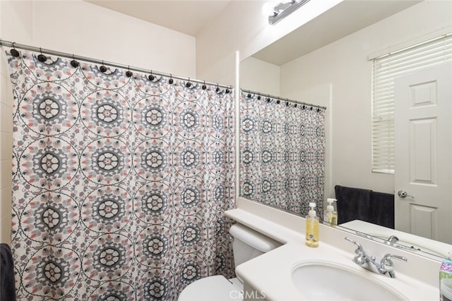 2845 Keystone Cir, Corona, CA 92882 - bathroom with toilet, vanity, and a shower with shower curtain