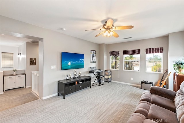 2845 Keystone Cir, Corona, CA 92882 - living room with a ceiling fan, baseboards, and light colored carpet