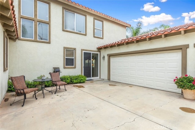 2845 Keystone Cir, Corona, CA 92882 - view of front of home featuring stucco siding, a tiled roof, concrete driveway, and a garage