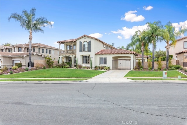 2845 Keystone Cir, Corona, CA 92882 - mediterranean / spanish-style home with an attached garage, driveway, a tile roof, stucco siding, and a balcony