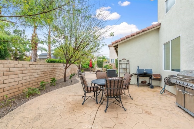 2845 Keystone Cir, Corona, CA 92882 - fenced backyard featuring area for grilling, a patio, central AC unit, and outdoor dining area