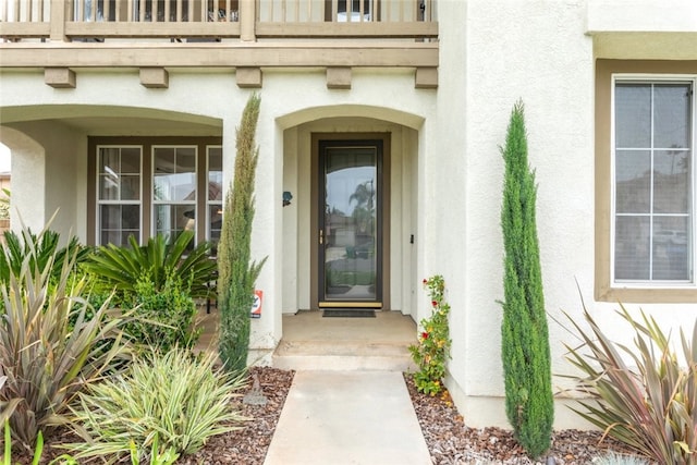 2845 Keystone Cir, Corona, CA 92882 - doorway to property featuring a balcony and stucco siding