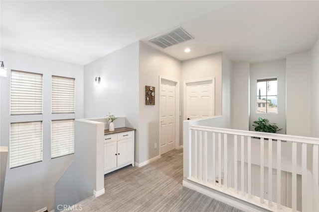 2845 Keystone Cir, Corona, CA 92882 - corridor featuring an upstairs landing, recessed lighting, baseboards, and light carpet