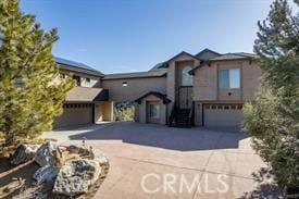 1800 Zermatt Dr, Pine Mountain Club, CA 93225 - view of front of property with a garage and concrete driveway