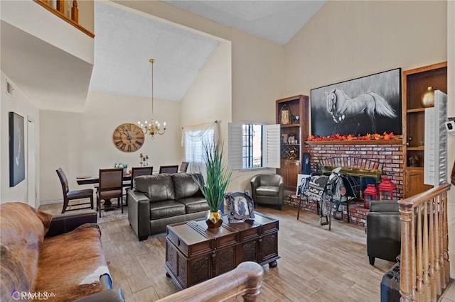 6351 Deacon Ave, Bakersfield, CA 93307 - living area featuring a notable chandelier, a fireplace, high vaulted ceiling, and wood finished floors