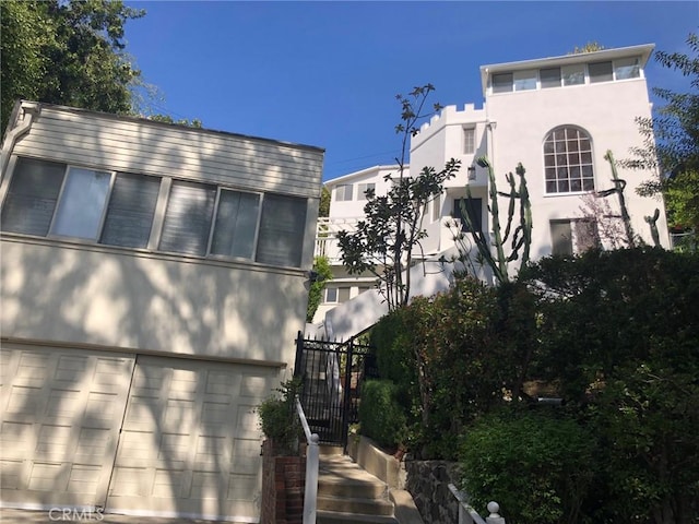 view of property exterior with stucco siding