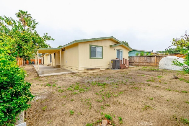1357 Mount Shasta St, Perris, CA 92570 - rear view of property featuring cooling unit, a patio area, a fenced backyard, and entry steps