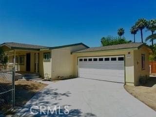 1357 Mount Shasta St, Perris, CA 92570 - ranch-style home with a garage, stucco siding, and concrete driveway