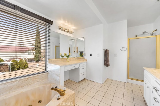 42851 Lemonwood Dr, Lancaster, CA 93536 - full bathroom featuring vanity, a stall shower, a whirlpool tub, and tile patterned floors