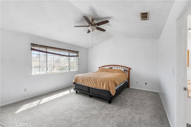 42851 Lemonwood Dr, Lancaster, CA 93536 - bedroom featuring a textured ceiling, carpet flooring, lofted ceiling, and ceiling fan