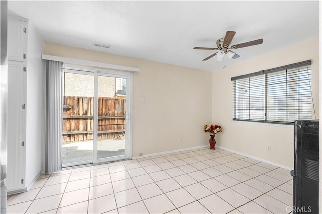 42851 Lemonwood Dr, Lancaster, CA 93536 - empty room with a ceiling fan and baseboards