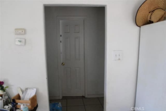 241 Hull Ave, Madera, CA 93638 - hall with tile patterned floors