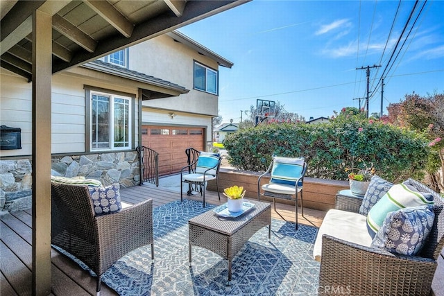 deck featuring an attached garage