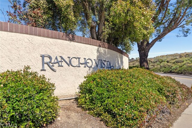 view of community sign