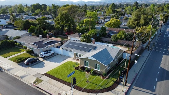 drone / aerial view with a mountain view and a residential view