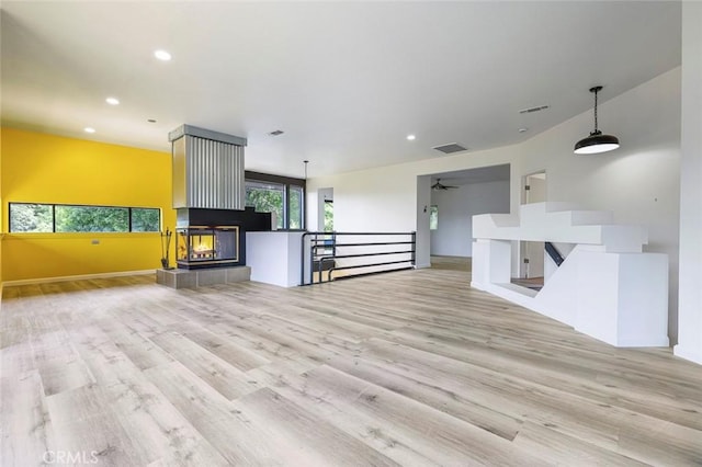 28951 Spring Valley Rd, Tollhouse, CA 93667 - unfurnished living room with recessed lighting, visible vents, and wood finished floors
