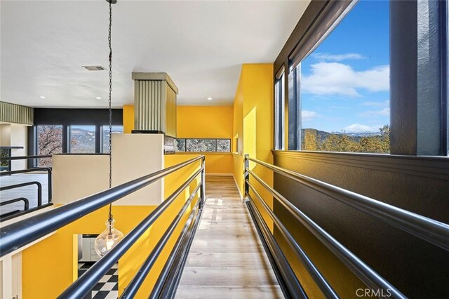 28951 Spring Valley Rd, Tollhouse, CA 93667 - hallway with visible vents and wood finished floors