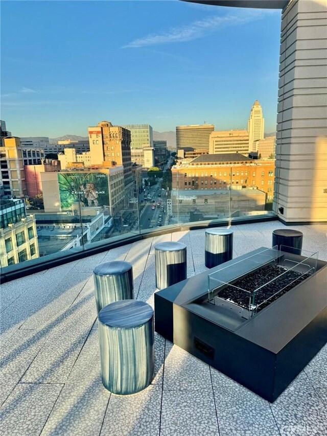 400 S Broadway Unit 1011, Los Angeles, CA 90013 - view of patio / terrace with a city view and a balcony