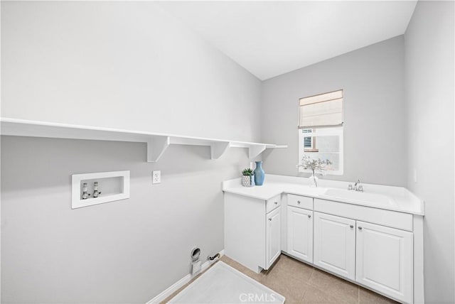 laundry area with a sink, cabinet space, gas dryer hookup, and hookup for a washing machine