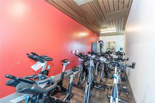 gym with wood finished floors and baseboards