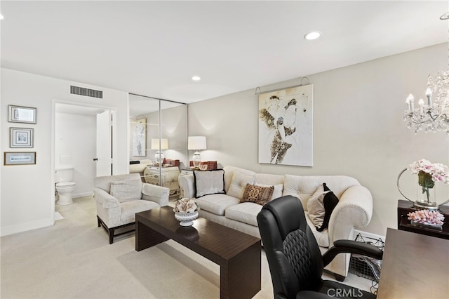 living room featuring recessed lighting, an inviting chandelier, baseboards, visible vents, and light carpet