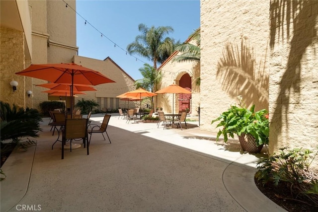 view of patio featuring outdoor dining space