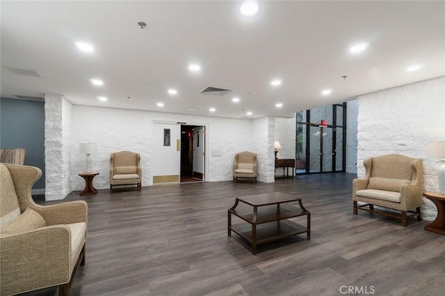 interior space with visible vents, recessed lighting, and wood finished floors