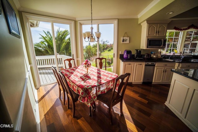 600 Monte Vista Dr, Santa Paula, CA 93060 - dining space featuring dark wood-type flooring, an inviting chandelier, and ornamental molding