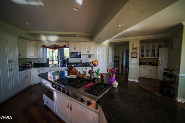 600 Monte Vista Dr, Santa Paula, CA 93060 - kitchen featuring dark wood finished floors, white cabinets, black microwave, and stainless steel gas cooktop