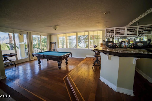 600 Monte Vista Dr, Santa Paula, CA 93060 - game room with indoor bar, baseboards, dark wood-style floors, a textured ceiling, and billiards