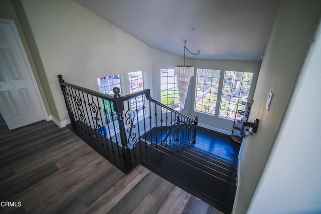 600 Monte Vista Dr, Santa Paula, CA 93060 - stairway featuring vaulted ceiling, wood finished floors, baseboards, and a chandelier