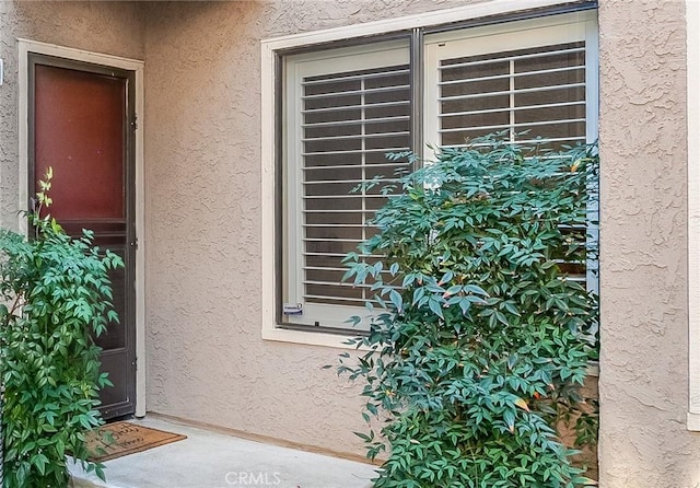 2304 Archwood Ln Unit 98, Simi Valley, CA 93063 - doorway to property with stucco siding