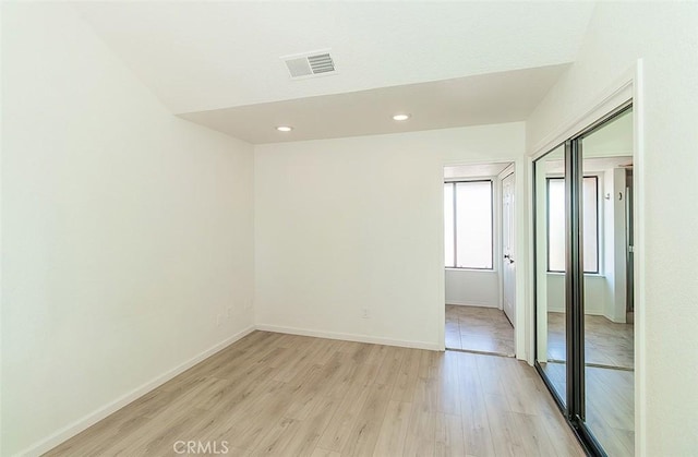 712 E Magill Ave, Fresno, CA 93710 - spare room featuring light wood-style floors and recessed lighting