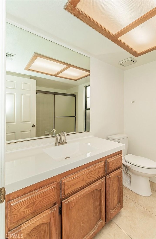 712 E Magill Ave, Fresno, CA 93710 - bathroom with vanity and tile patterned flooring